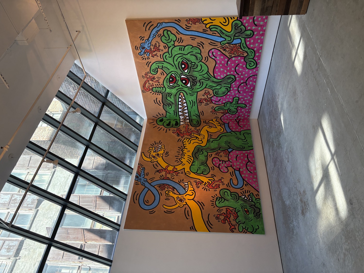 The skylit, exposed-brick gallery at 60 White Street