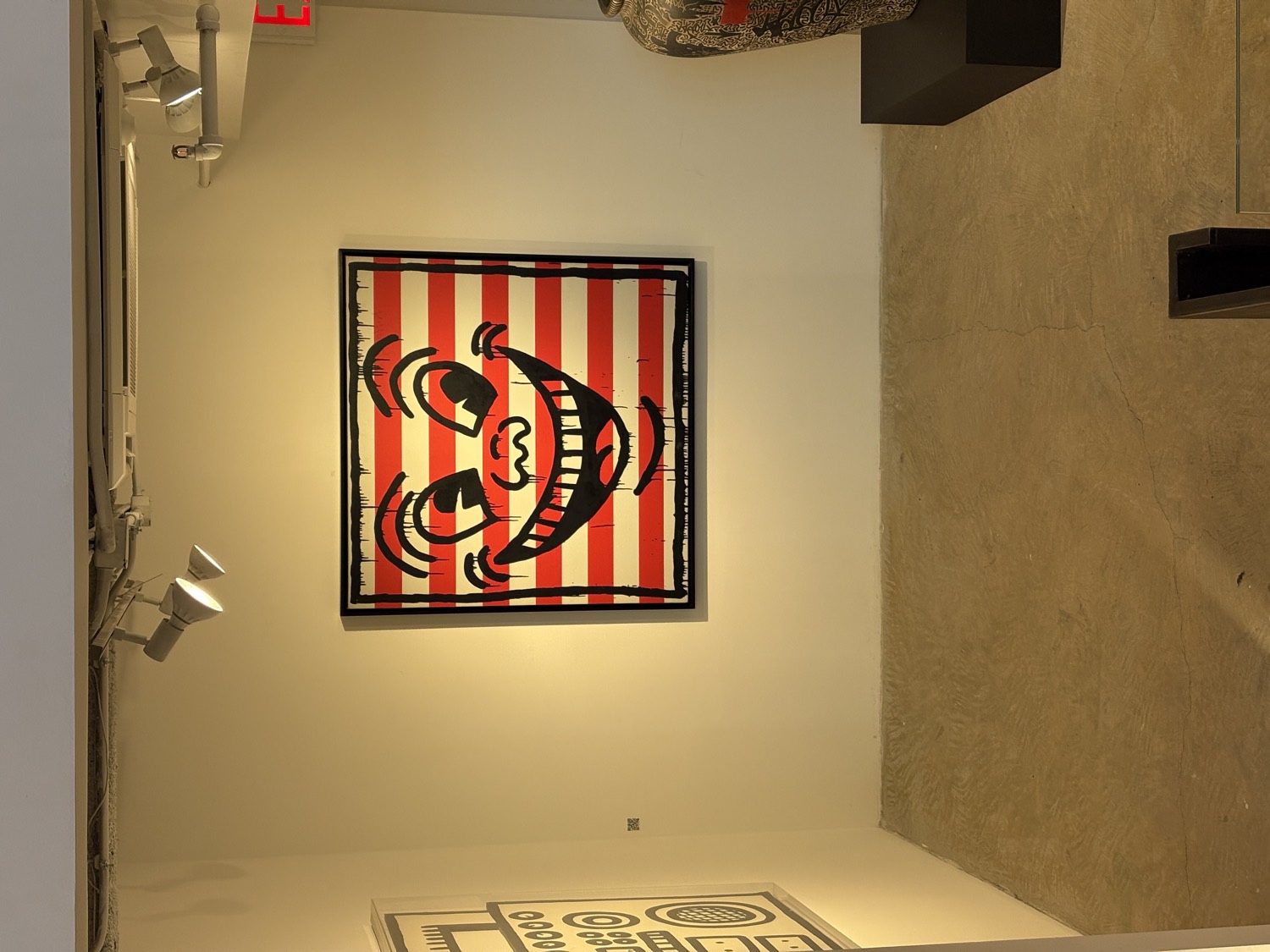 Keith Haring striped smiling face painting
